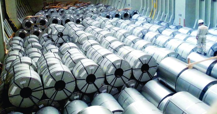 Steel coils stacked in a warehouse